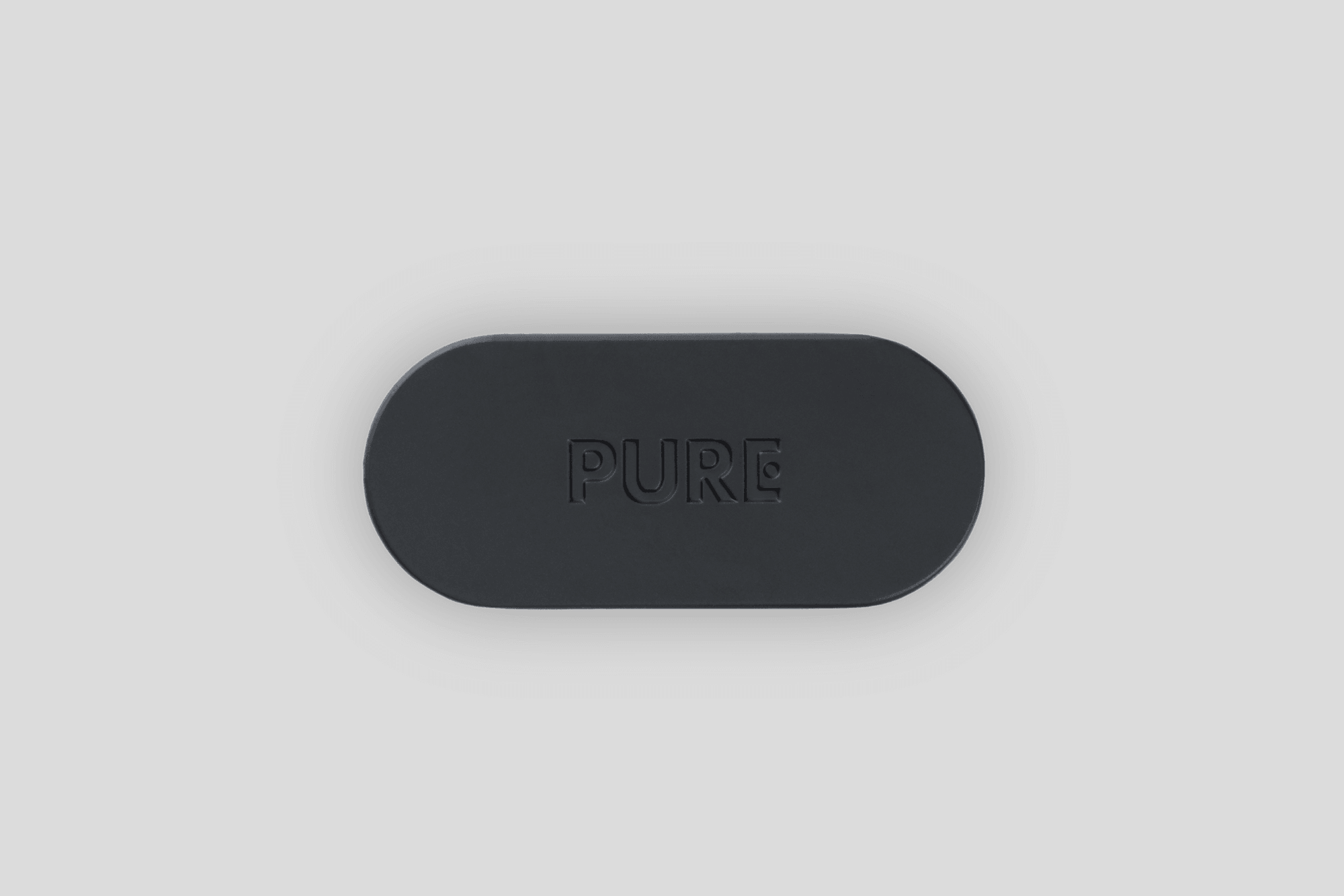 a black PURE solid perfume box from above